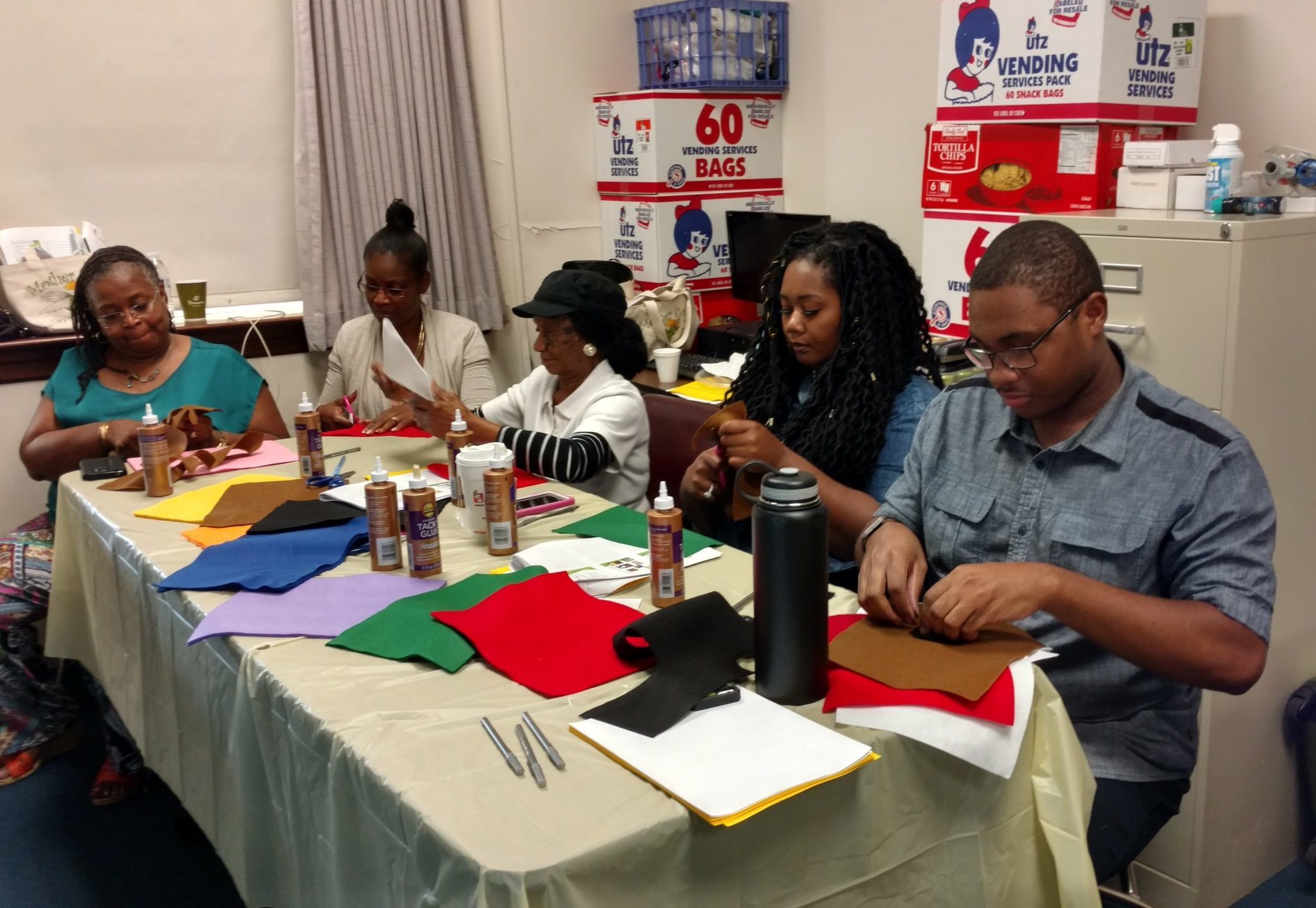 Teachers creating felt characters at an MGOL workshop in Maryland