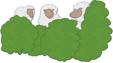 Three sheep are hiding behind some bushes.